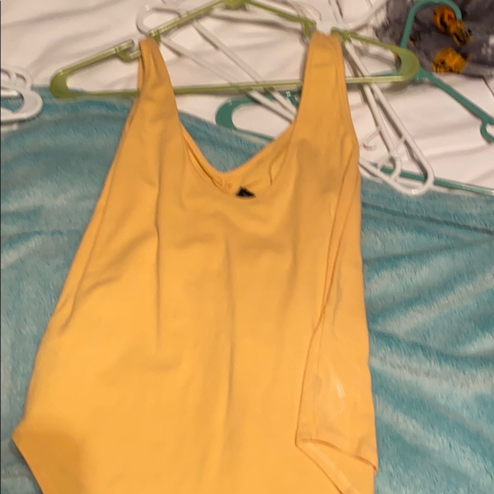 Yellow bodysuit
